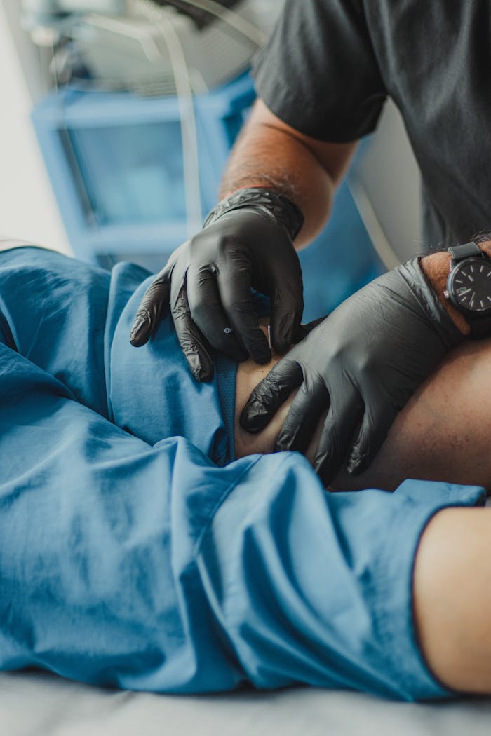 A close-up view of an acupuncture therapy session focusing on a patients wellness with a skilled practitioner.